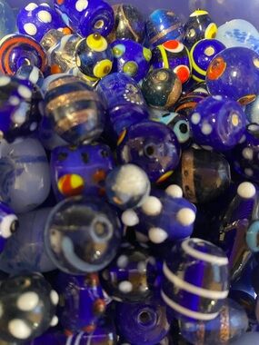 Lamp work blue glass bead bag